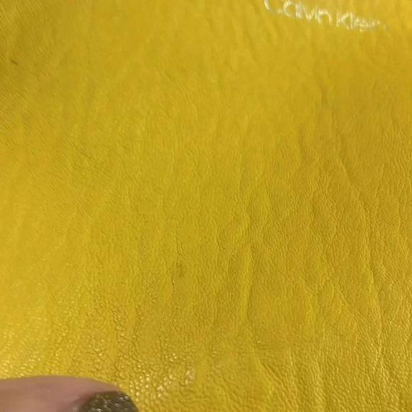 Calvin Klein few spots well loved pvc material. - Picture 5 of 10